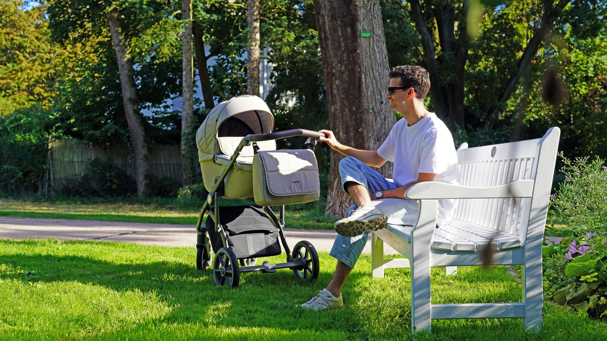 Parent walking with stroller outdoors